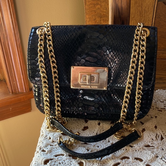 Michael Kors woman’s black embossed over the shoulder purse NWOT. Gold hardware. - Picture 2 of 7